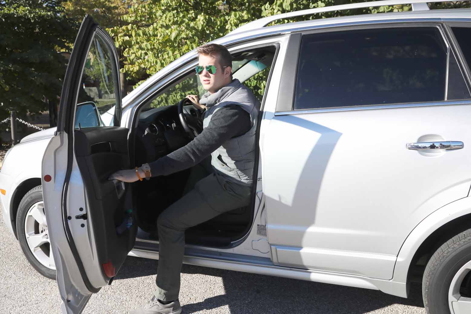 Man stepping out of vehicle